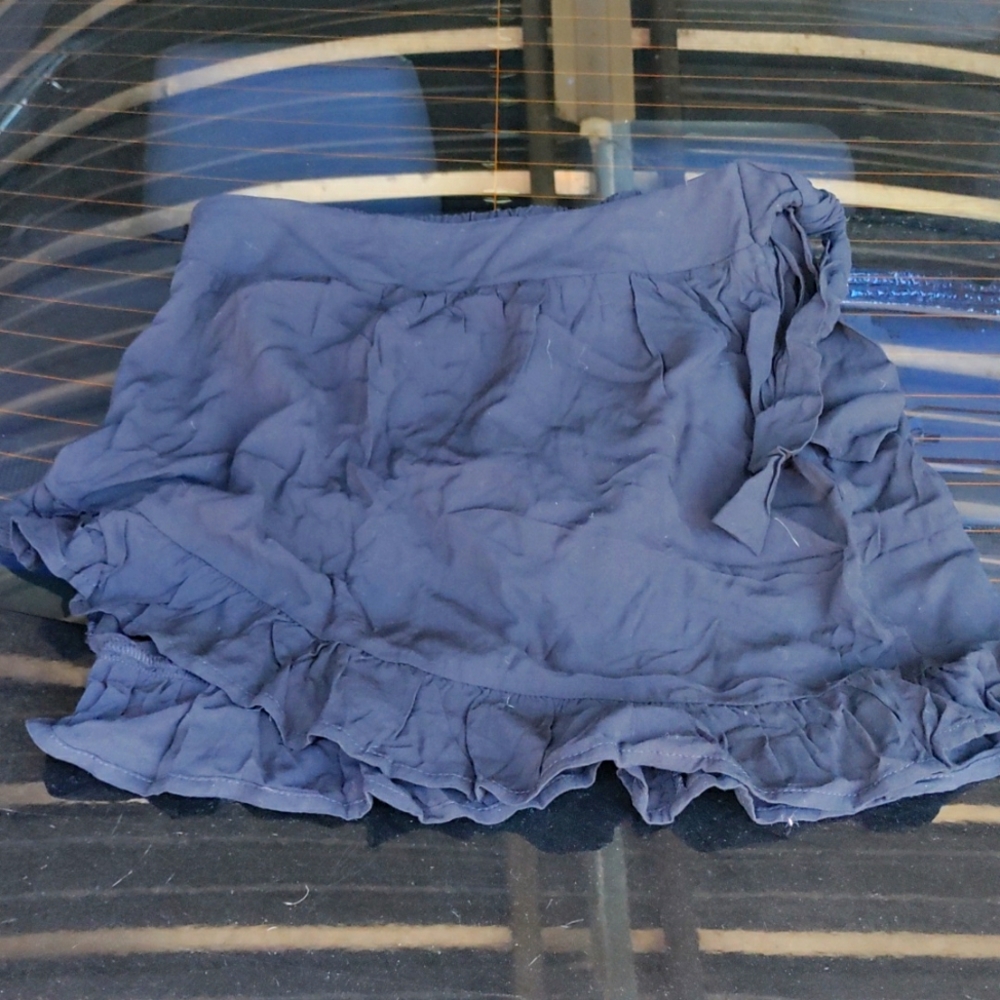 Brand new, no tags, cute black, wrap around...